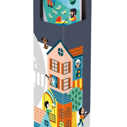 A tall, narrow retail display stand or poster featuring a colorful illustrated city street scene with houses, cars, pedestrians, and a map window near the top, shown on a plain white background.