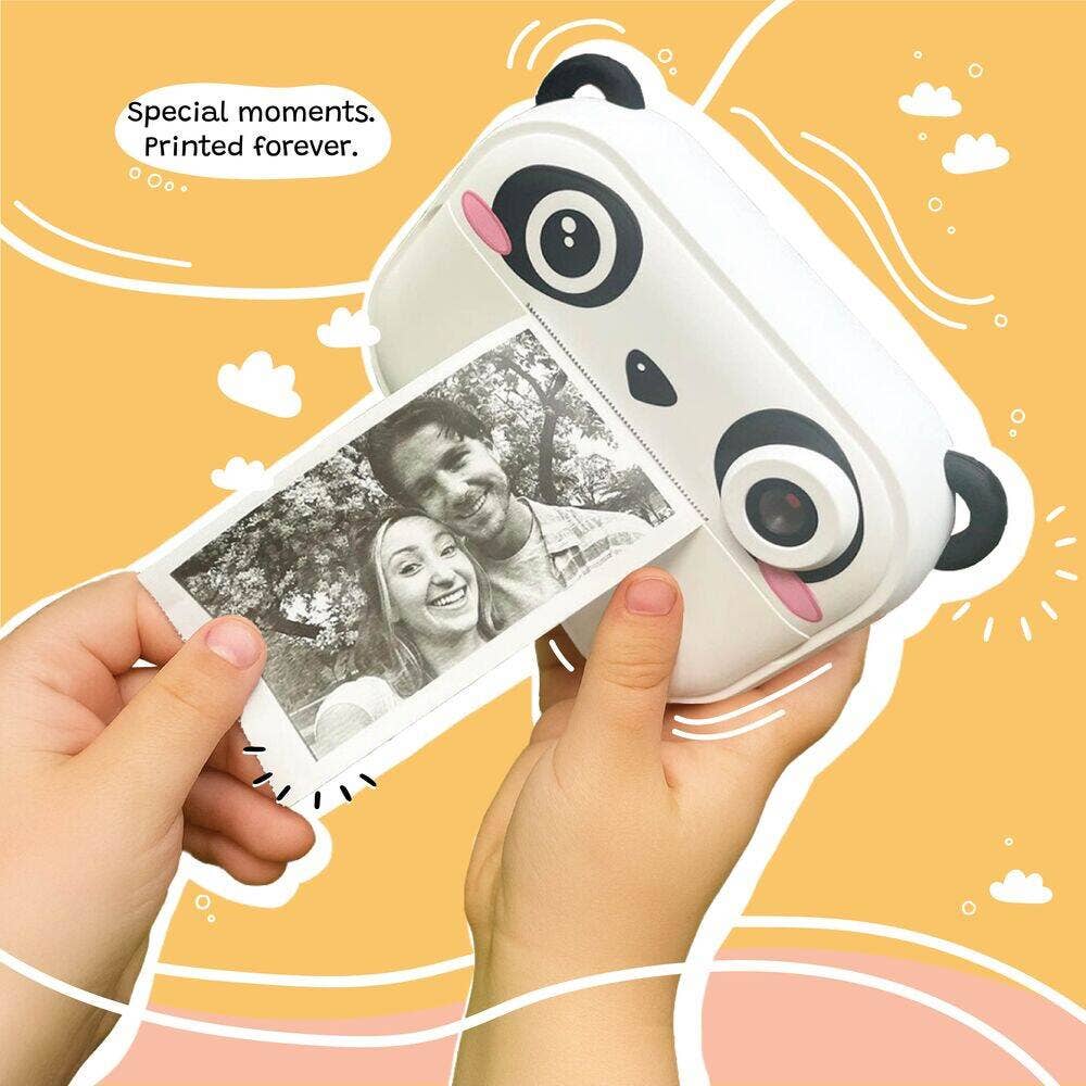 Panda-shaped photo printer with a printed photo held by hands against a yellow background