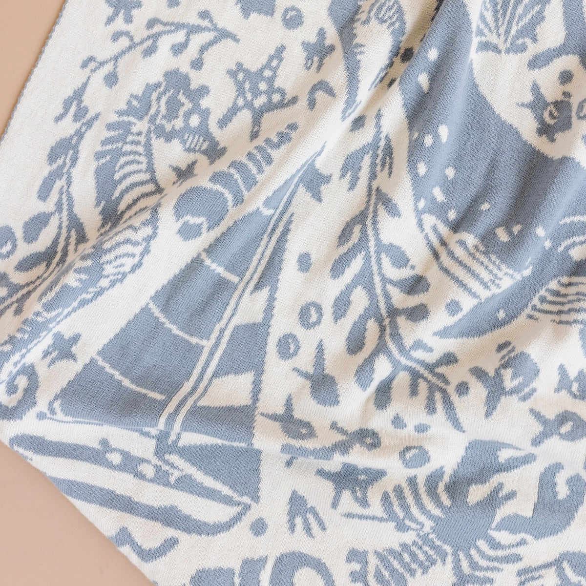 Close-up of blue and beige patterned fabric