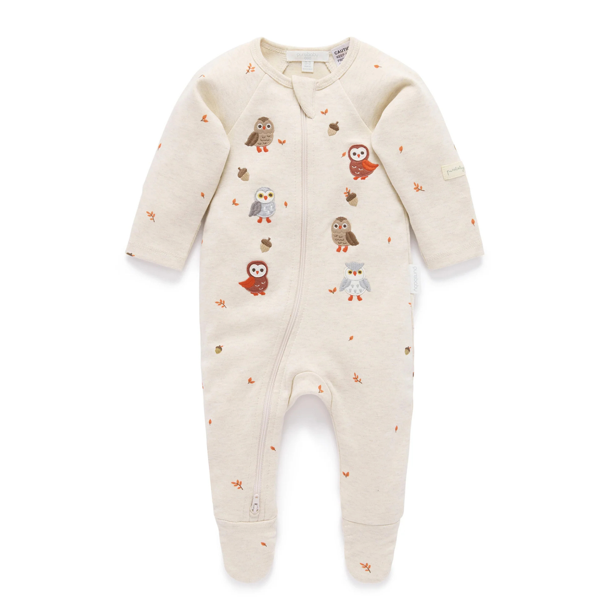 A cream-colored baby footed sleeper with a front zipper and an all-over autumn owl print, shown flat on a white background.