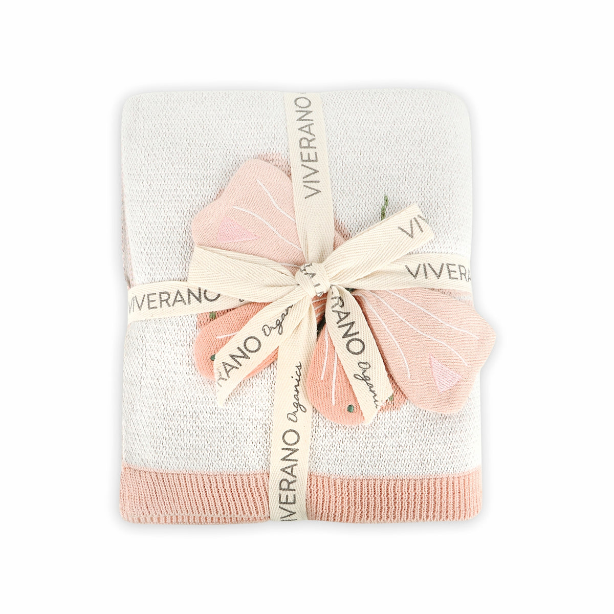 Folded pink and white blanket with a ribbon, branded 'Viverano', on a white background