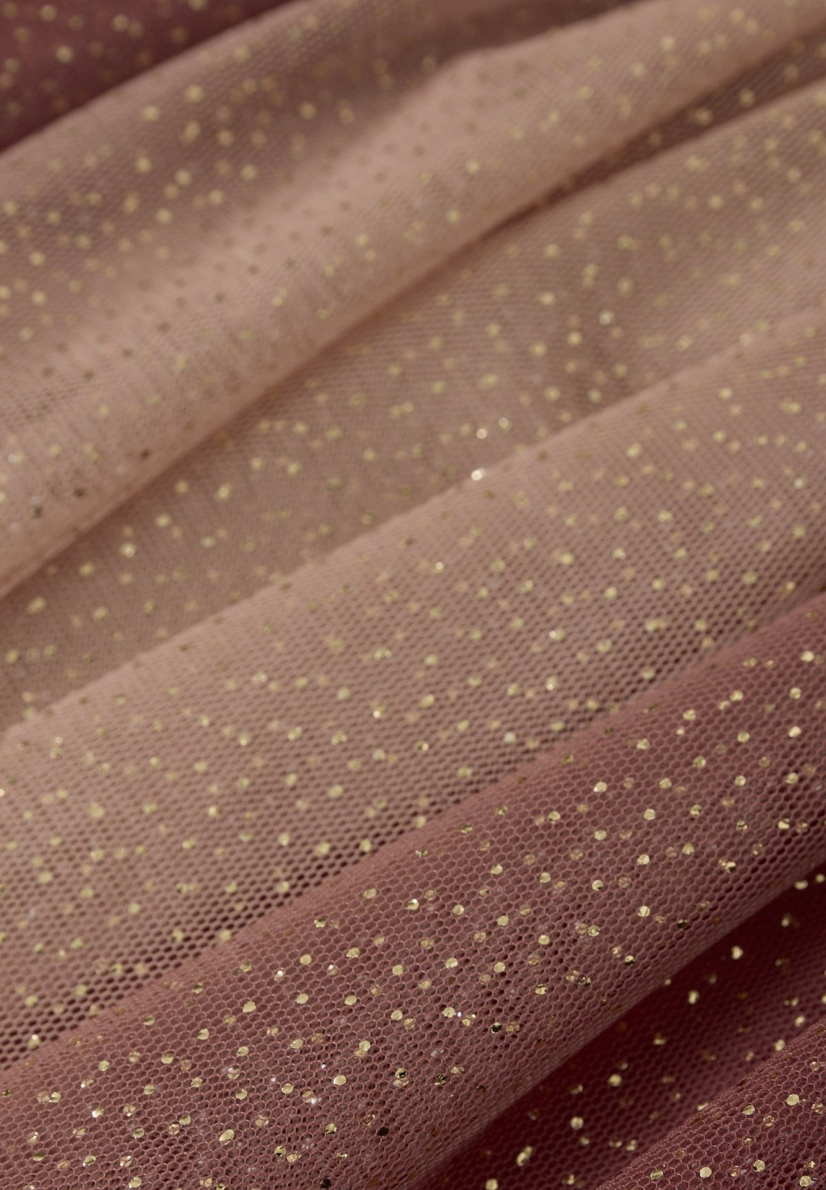 Brown fabric with gold polka dots