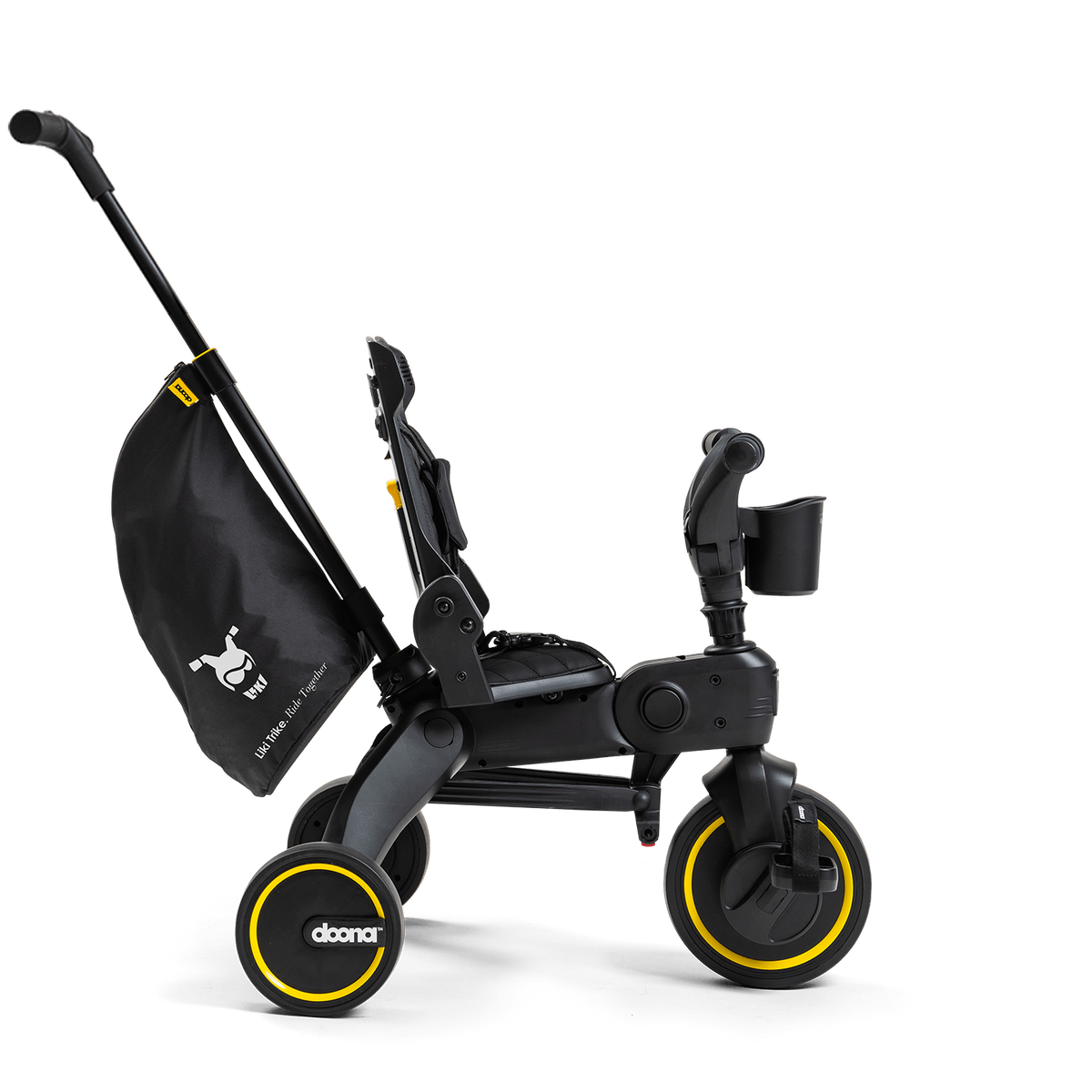 Black and yellow stroller with a baby seat on a white background