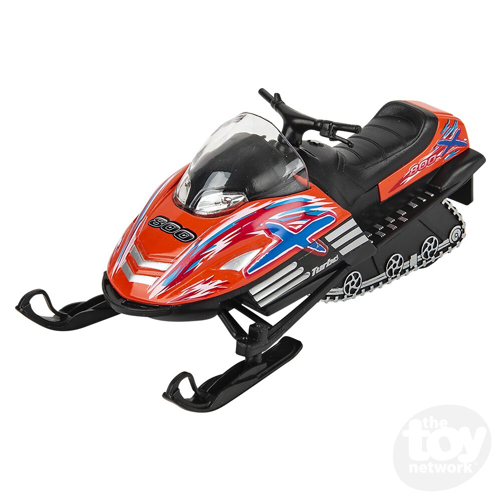 Model snowmobile with orange and black design on a white background