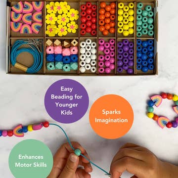 Colorful beading kit with beads and tools, shown with children's hands working on a project.