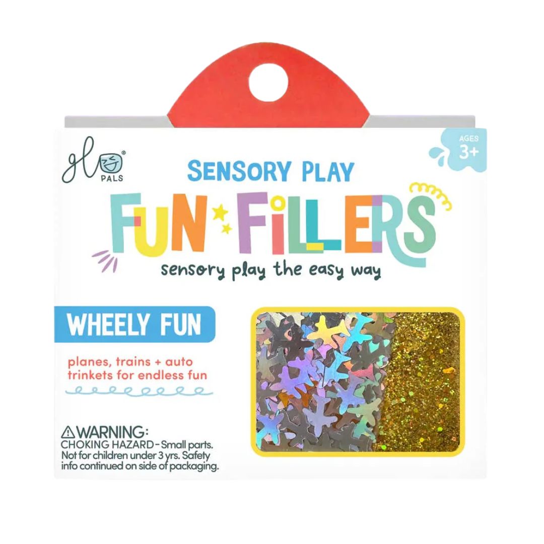Sensory Play 'Fun Fillers' toy set in its retail packaging, featuring a red hanging tab, colorful text, and a window showing multicolor star-shaped confetti and gold glitter.