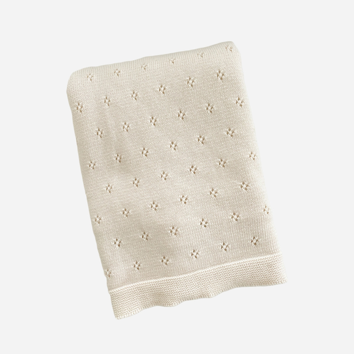 Beige textured towel on a white background