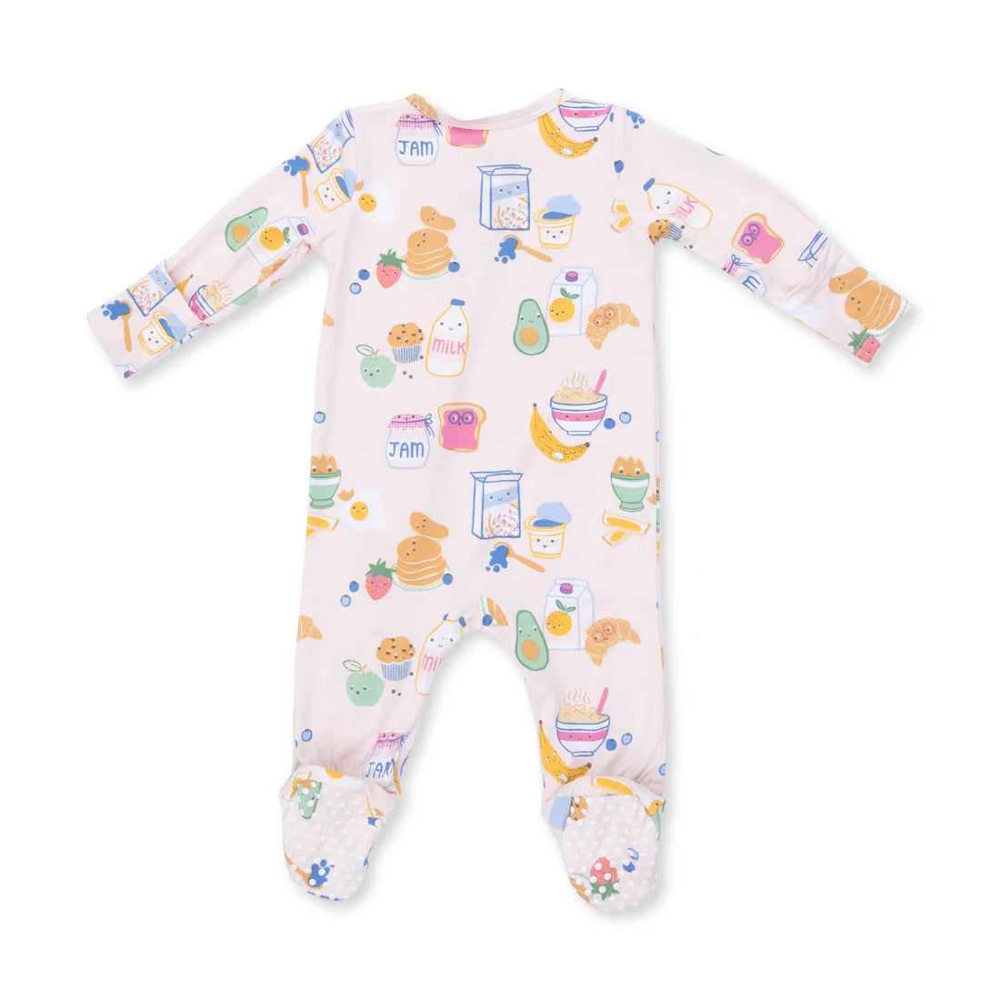 A baby long-sleeve footed sleeper in a pale pink color, decorated with a colorful cartoon breakfast pattern including pancakes, avocado, milk, and fruit.