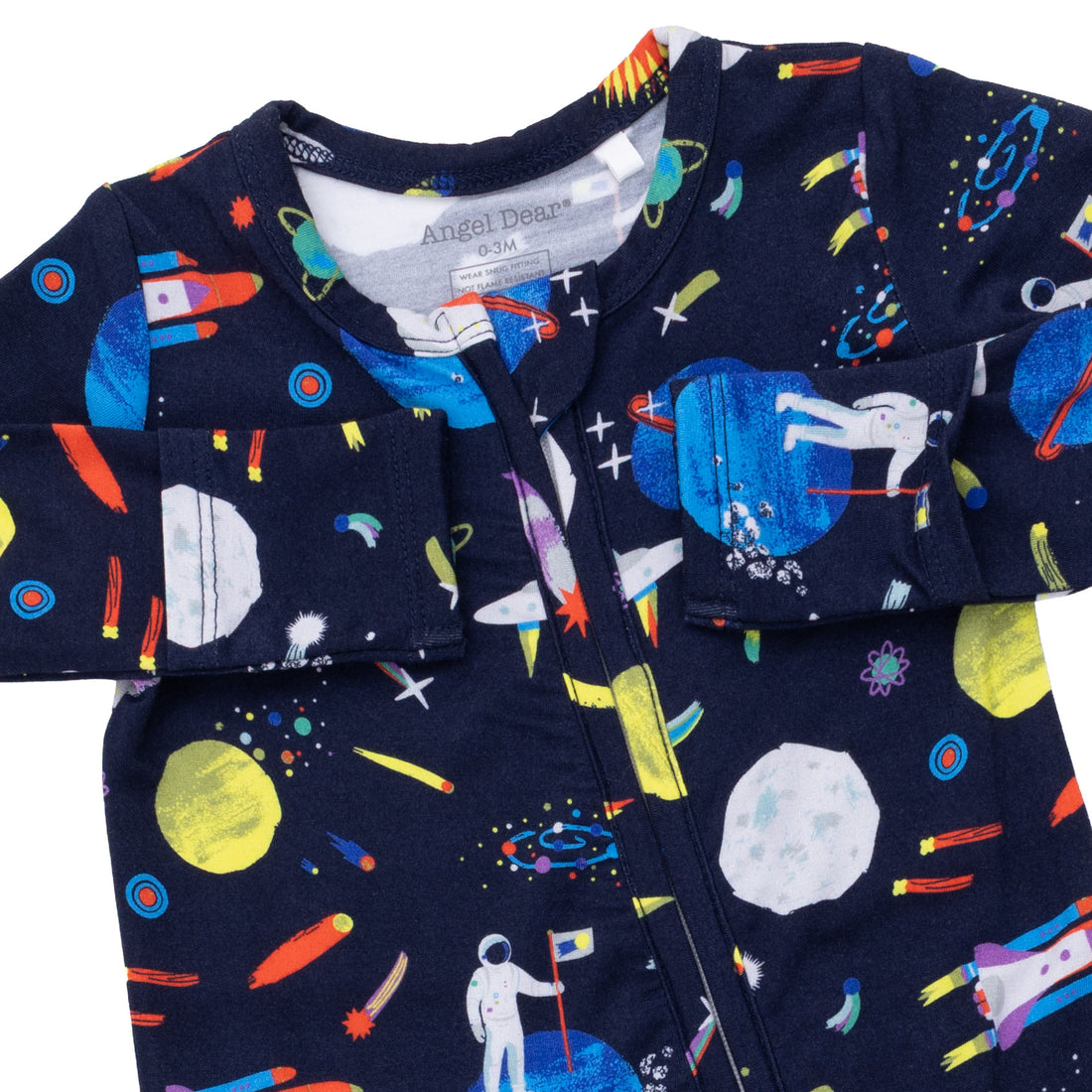 Children's outfit with space-themed print on a navy background