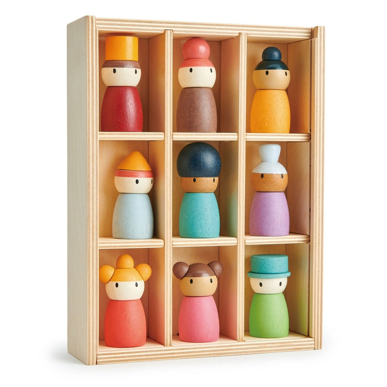 Set of colorful wooden dolls in a wooden display case