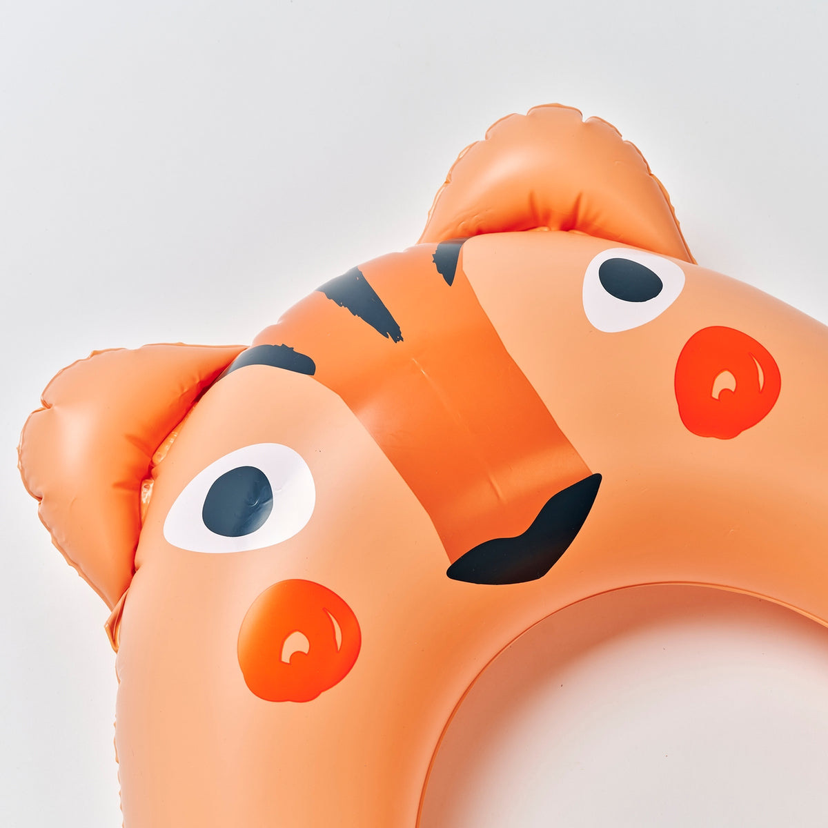Inflatable pool toy shaped like a fish on a white background
