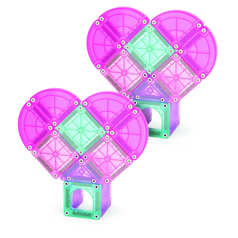 Two heart-shaped building block sets in purple and green on a white background