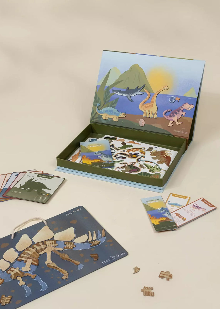 Children's educational puzzle set with dinosaur-themed cards and box on a beige background