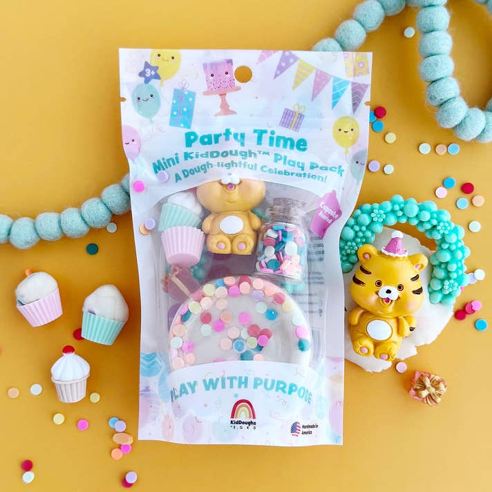 Play dough set with packaging labeled 'Party Time' on a yellow background with confetti.