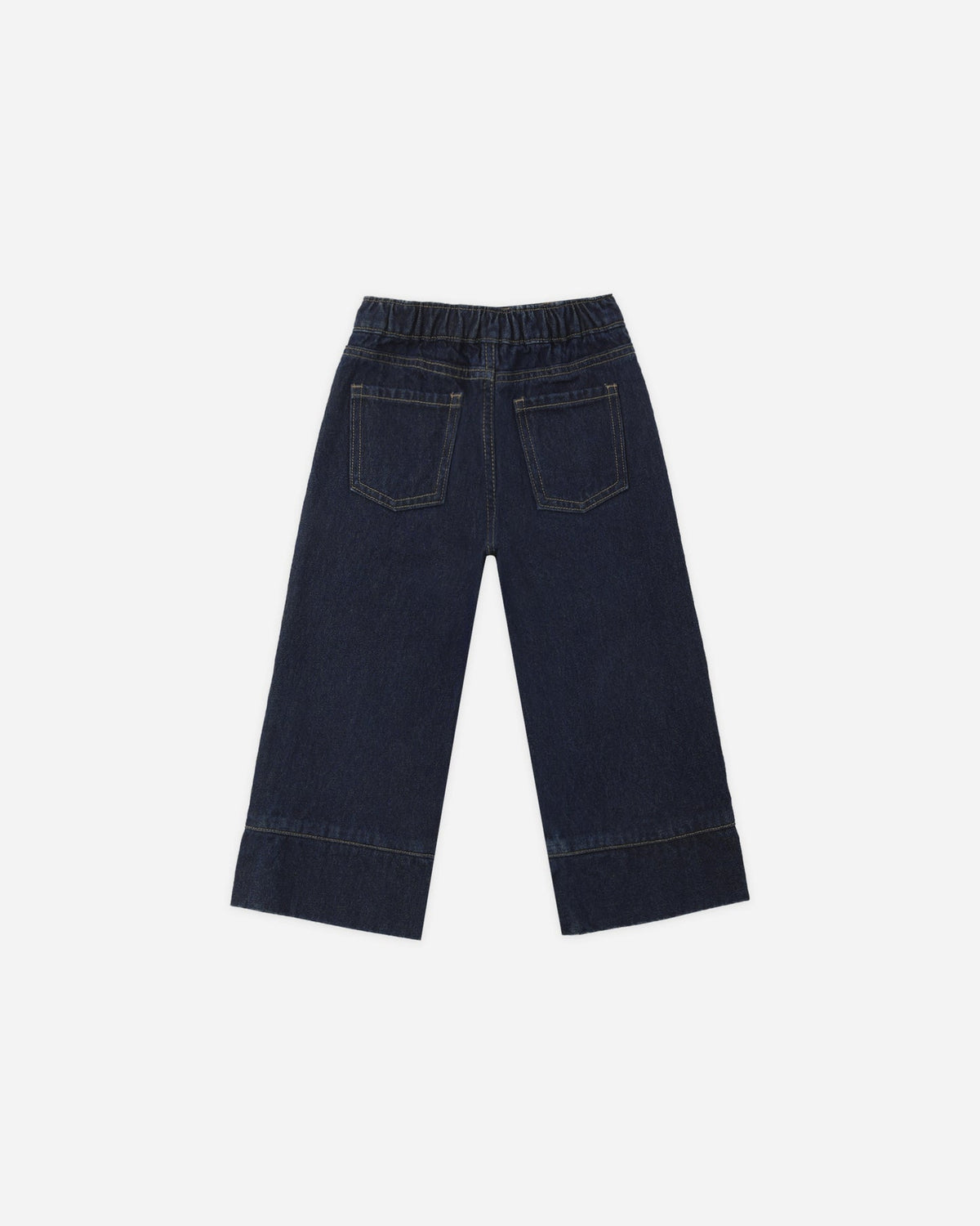 Dark navy blue denim cropped pants with an elastic waistband and back pocket details, shown from the back on a light gray background.