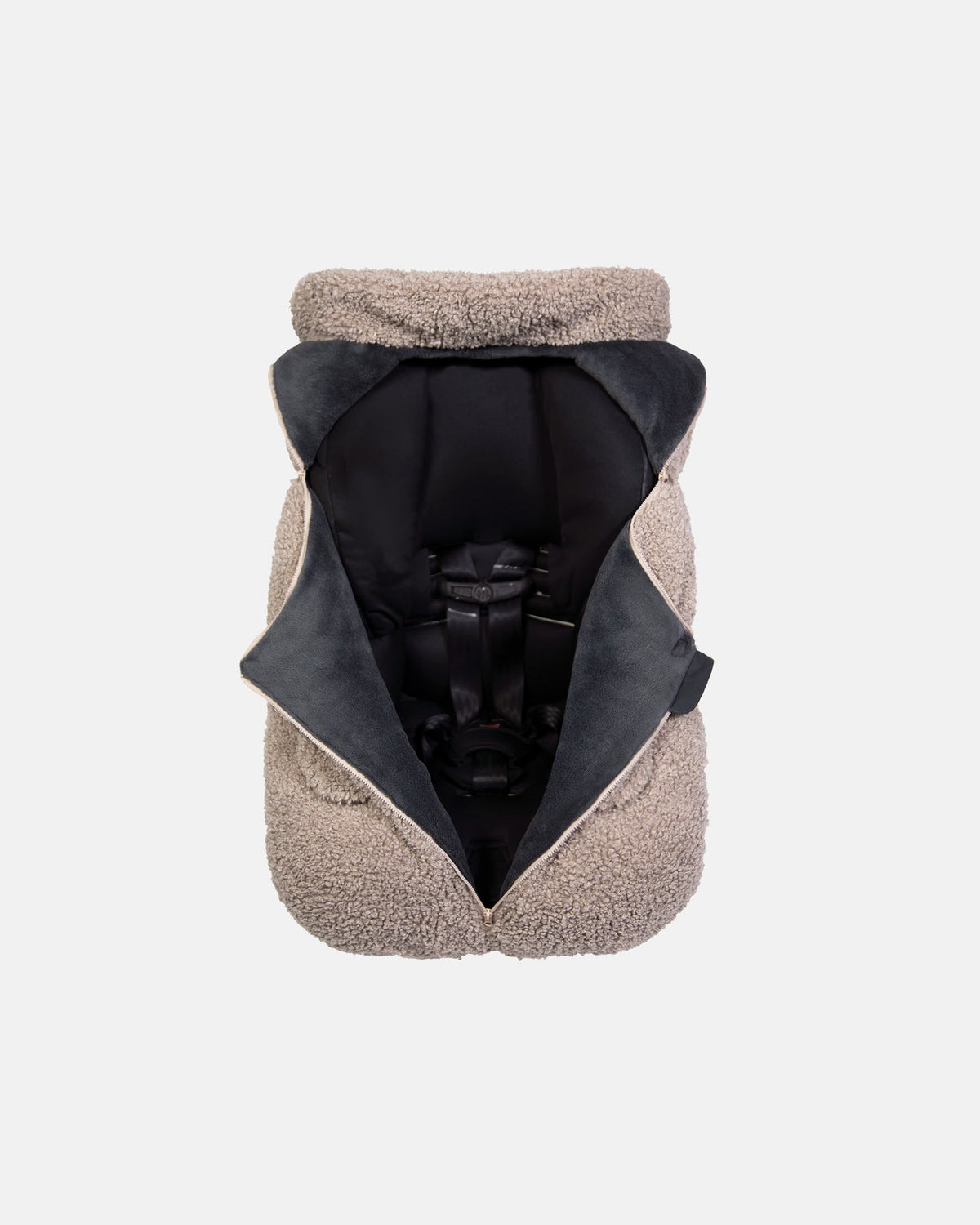 Beige pet coat with black interior on a white background