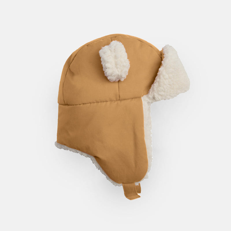 A brown and white sherpa-lined baby hat with bear ears, featuring an adjustable snap neck closure.