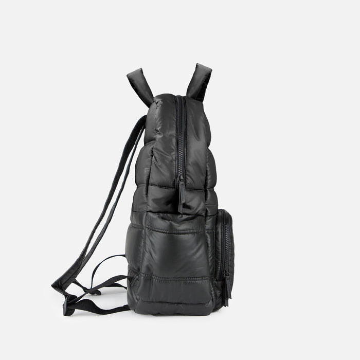 Black backpack on a light gray background