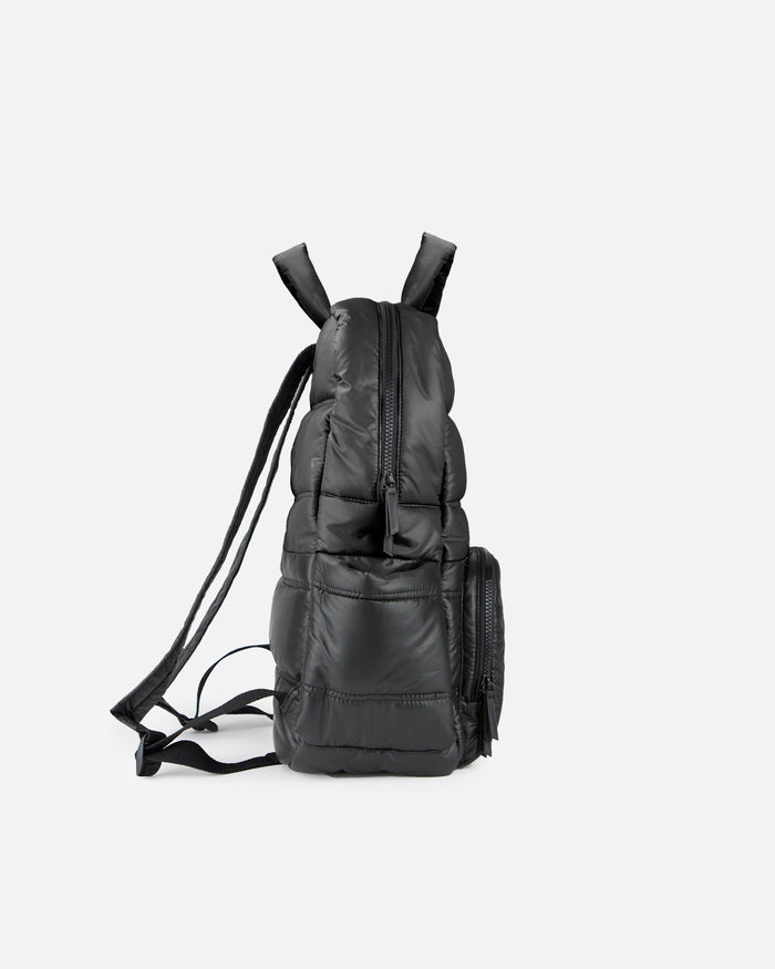 Black backpack on a light gray background