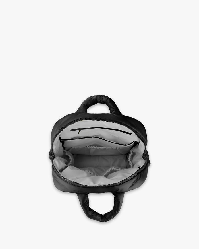 Black backpack on a white background