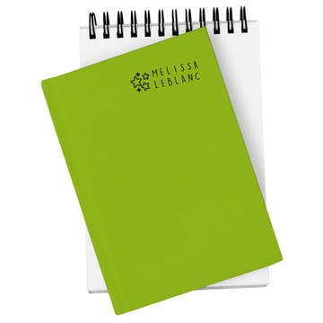Green notebook with 'Melissa LeBlanc' branding on a white background