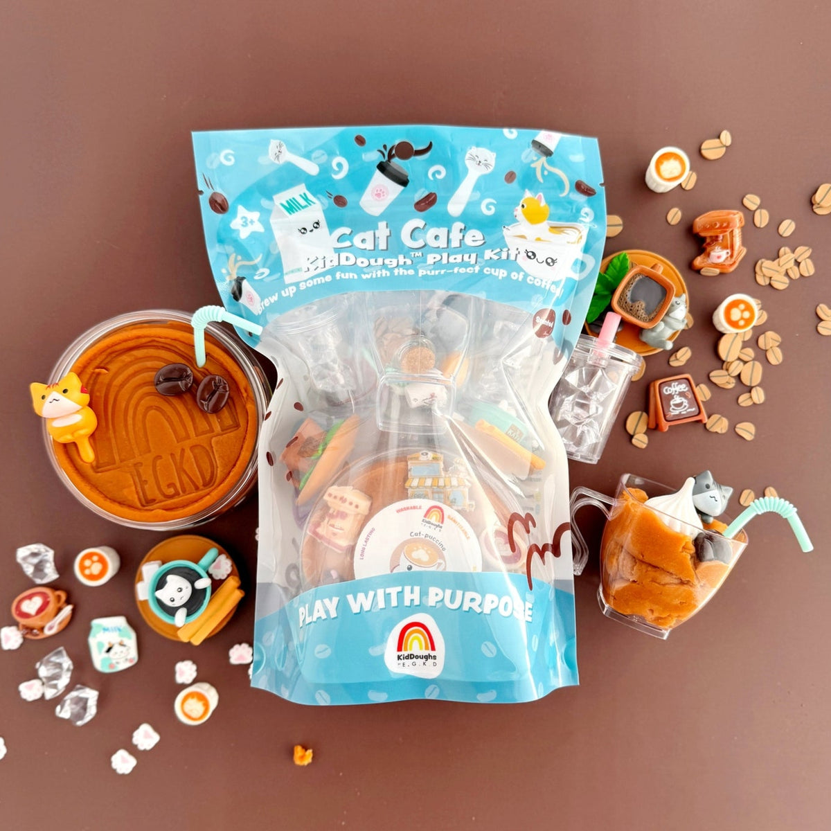 Cat Cafe Play Dough Play Kit with various play items on a brown background