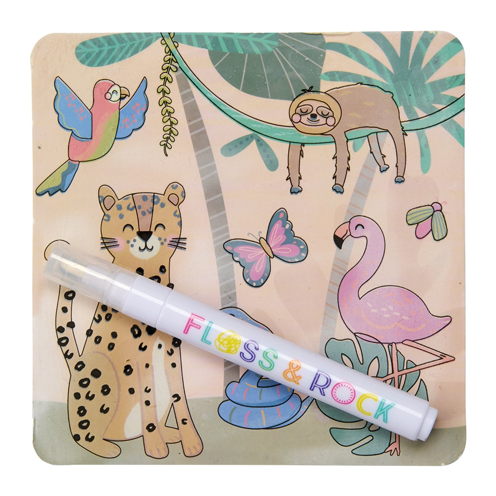 Children's desk mat with cartoon animals and a pen on a white background