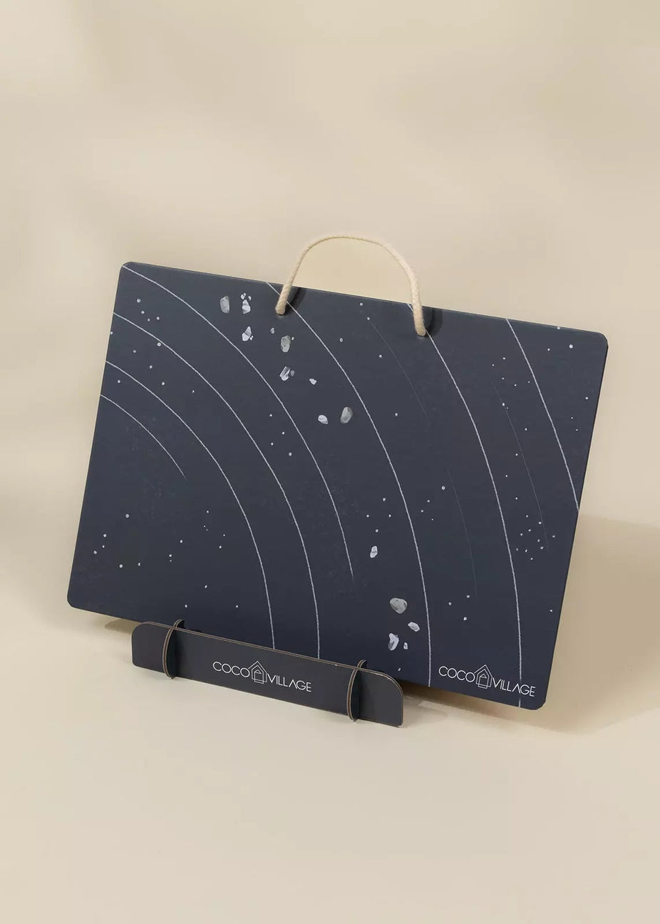 Dark blue mat with white patterns on a beige background