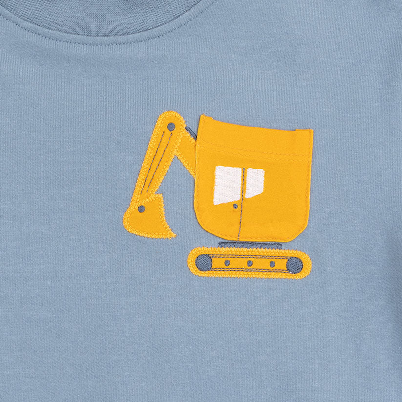 Yellow excavator design on a blue shirt