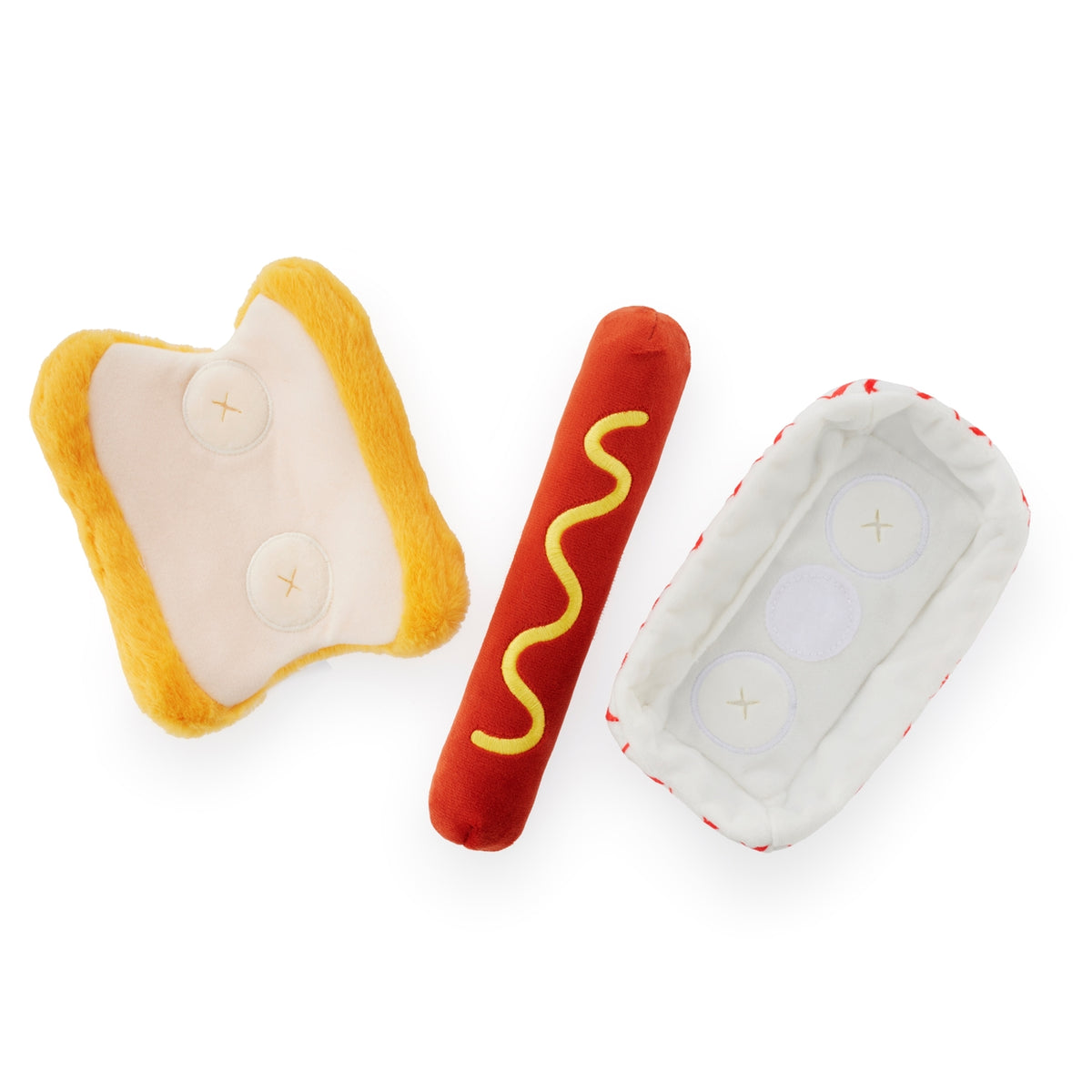 Plush toys shaped like a hot dog, bun, and tray on a white background