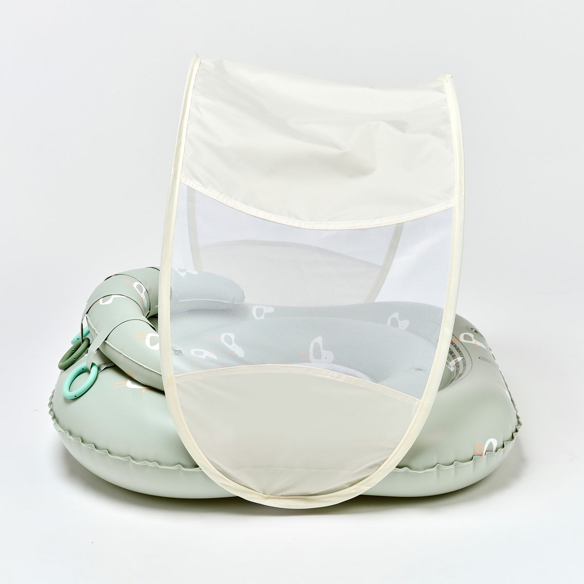 Mint green inflatable pool float with a mesh cover on a light gray background