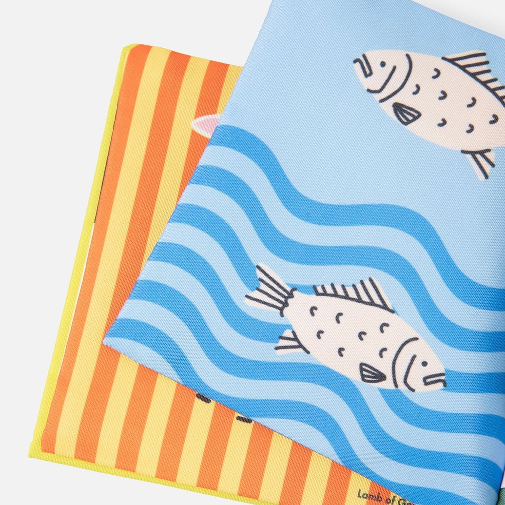Two colorful napkins with fish designs on a white background