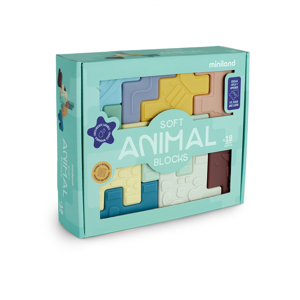 Box of soft animal blocks by miniland on a white background