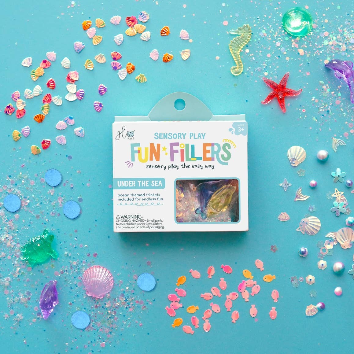 Sensory play fun fillers packaging with sea-themed toys on a blue background