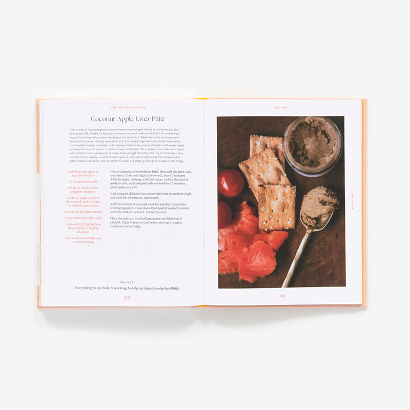 Open book showing a recipe with an image of food on a white background