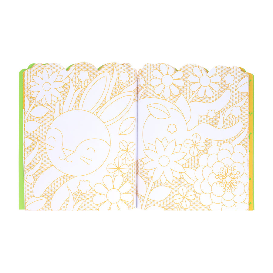 Open book with floral and animal illustrations on a white background
