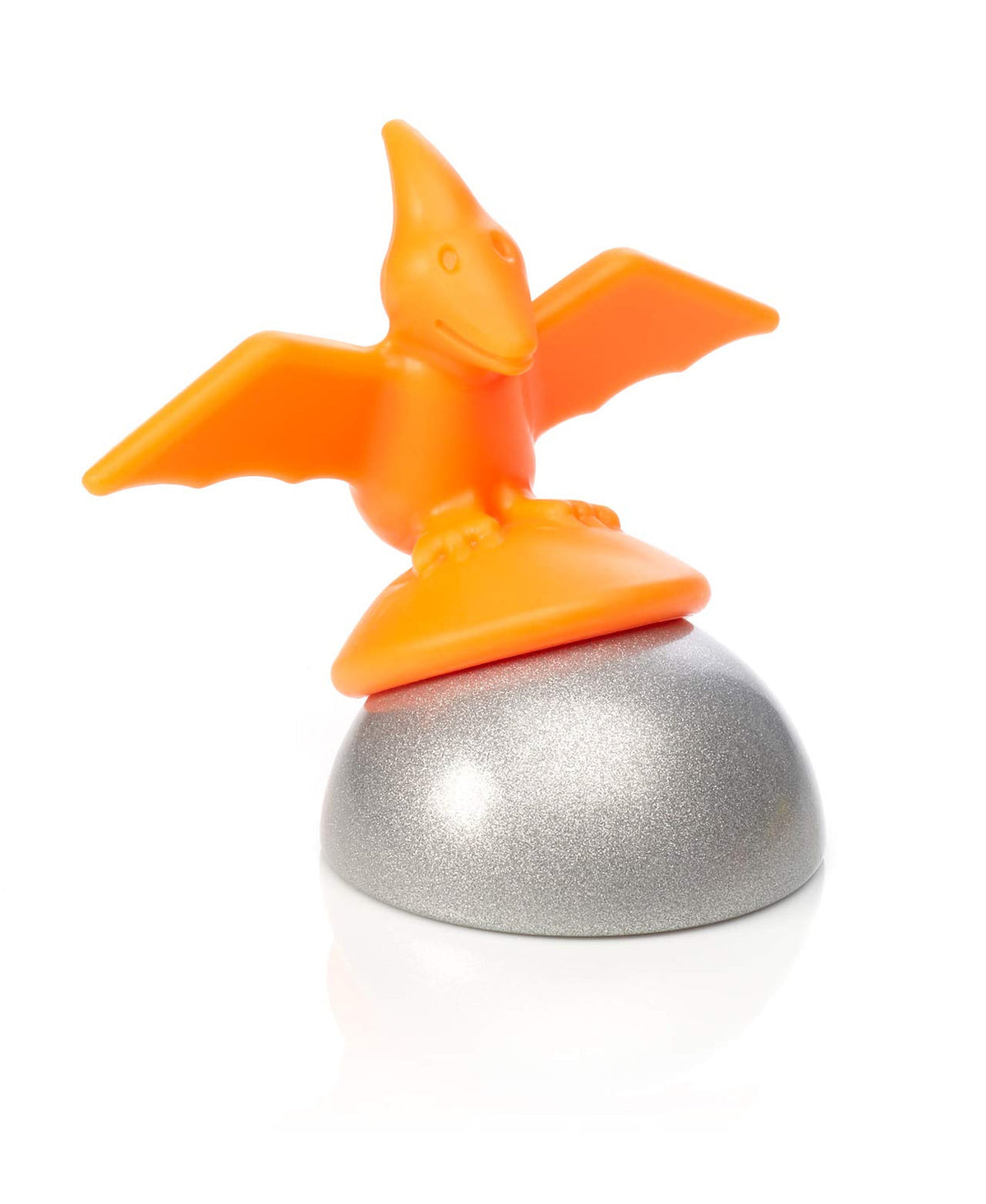 Orange toy pterodactyl on a silver base against a white background
