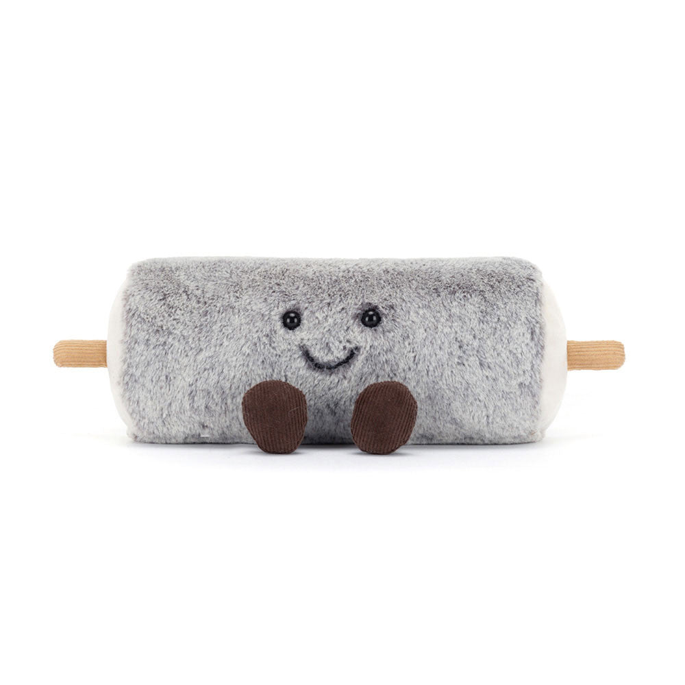 Plush toy rolling pin with a face on a white background