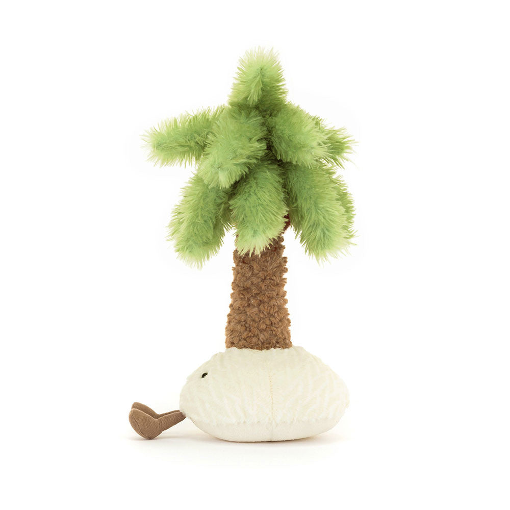A plush palm tree toy with a smiling face, green fronds, and a white base.