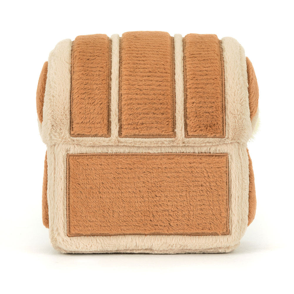 Cube-shaped plush toy with brown and beige pattern on a white background