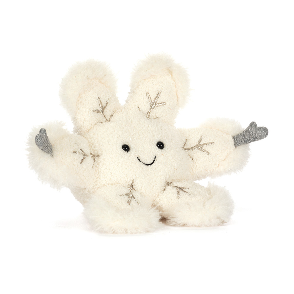 Plush toy rabbit with snowflake patterns on a white background
