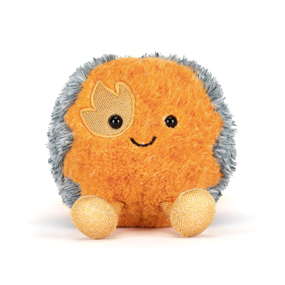 Plush toy hedgehog with a happy expression on a white background