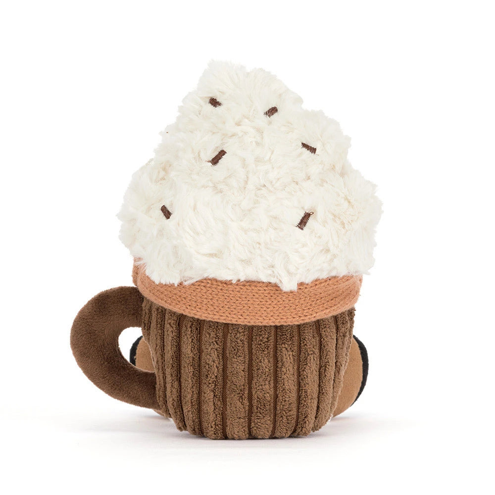A plush cupcake toy with a fluffy white frosting top, brown cupcake liner, and a small handle on the side, photographed on a clean white background.
