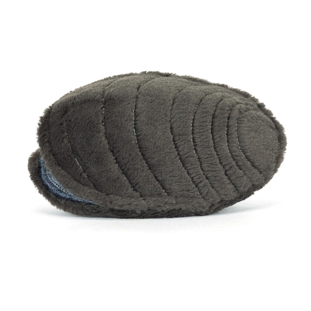 Dark gray quilted fabric pad on a white background