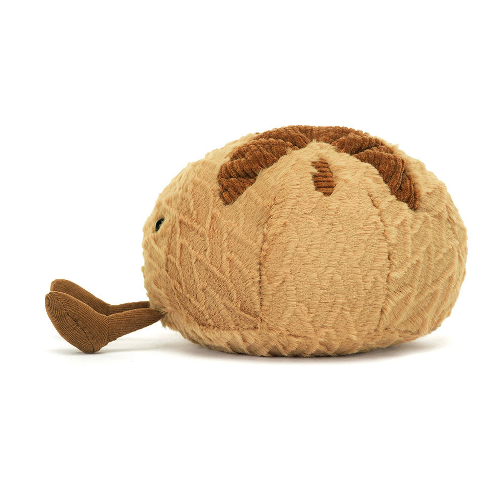 Plush toy shaped like a brown and beige shell on a white background