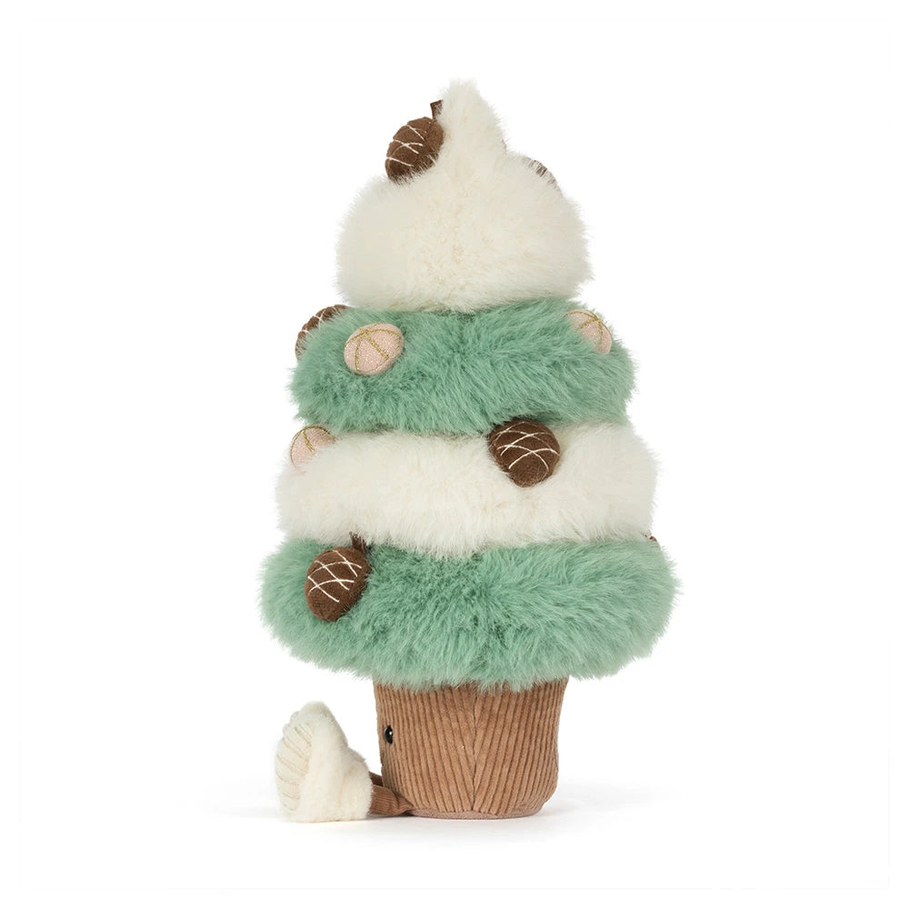 A plush cupcake-shaped toy or decorative figure with fluffy white and mint green frosting-like layers, brown acorn ornaments, and a brown corduroy-like base on a white background.