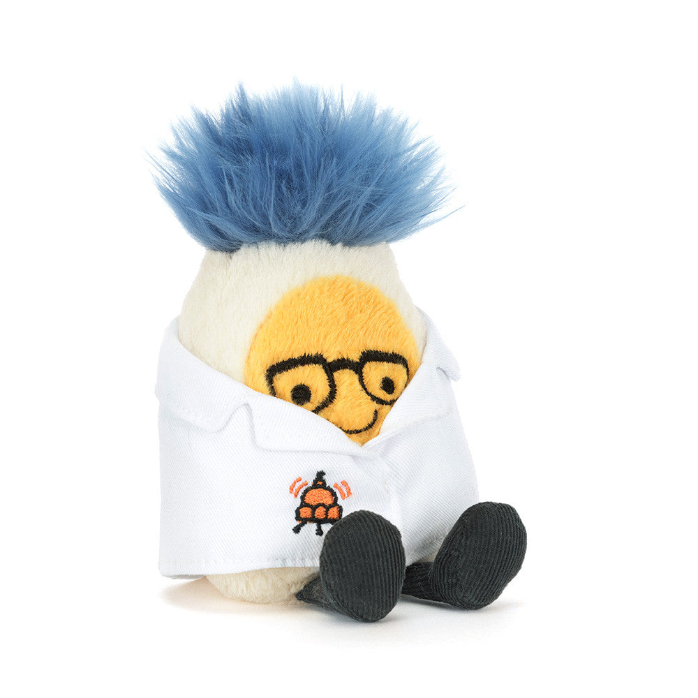 A plush character toy with bright blue hair, a cream-colored body, a white lab coat, and black shoes, shown against a plain white background.
