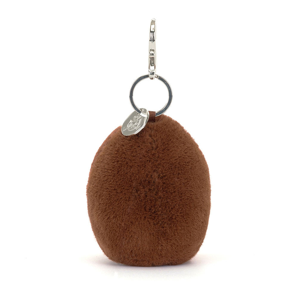Brown fluffy keychain with a silver tag on a white background