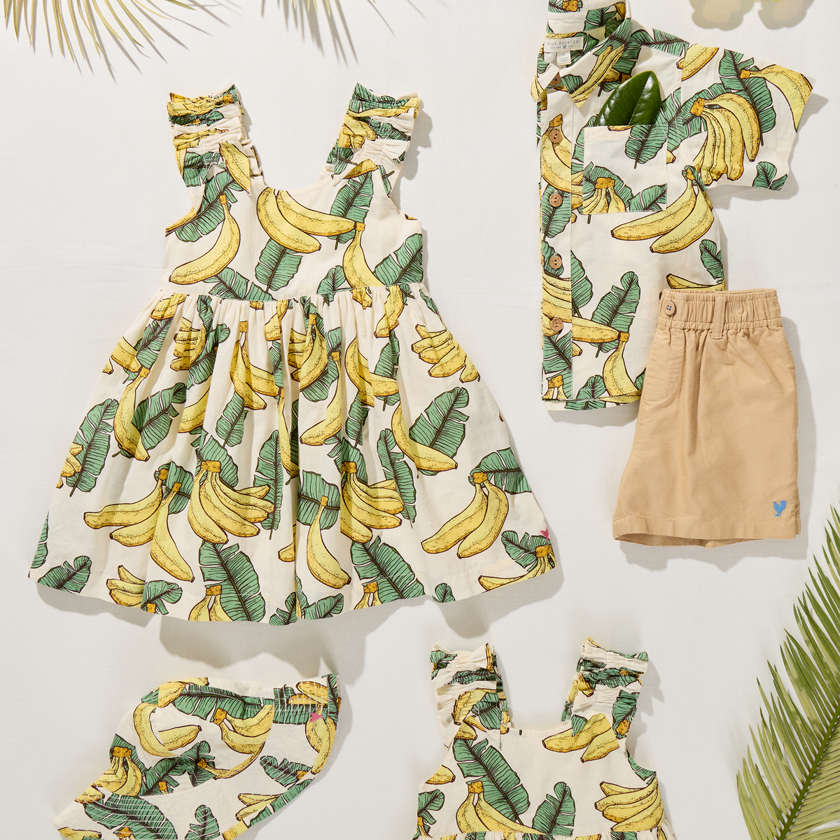 Children's outfit with banana pattern on a white background