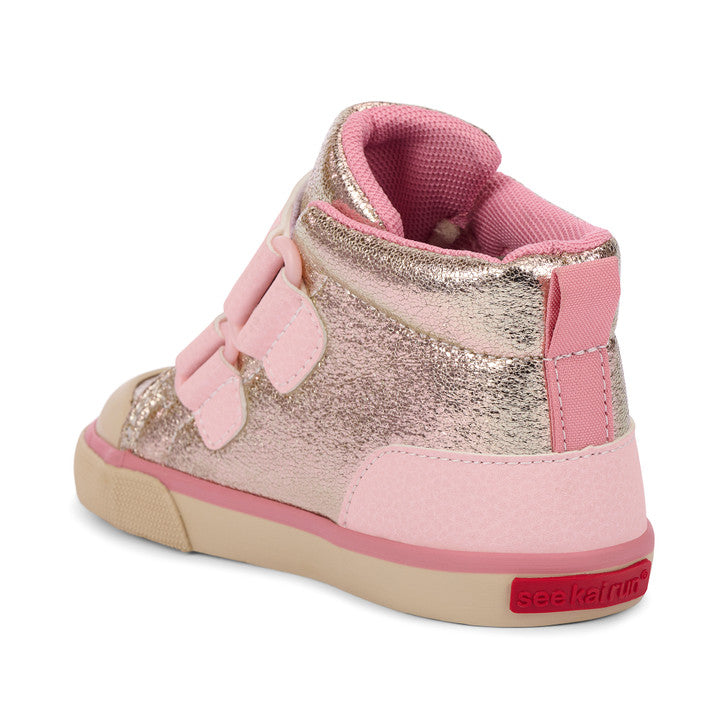 Pink and gold high-top shoe with a bow on a white background